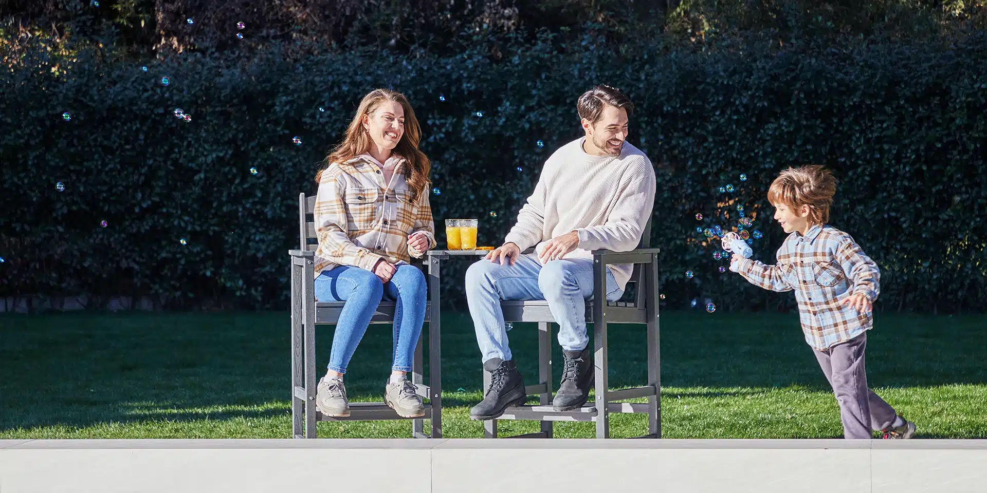 Happy Family with Counter Height Chairs on the Garden