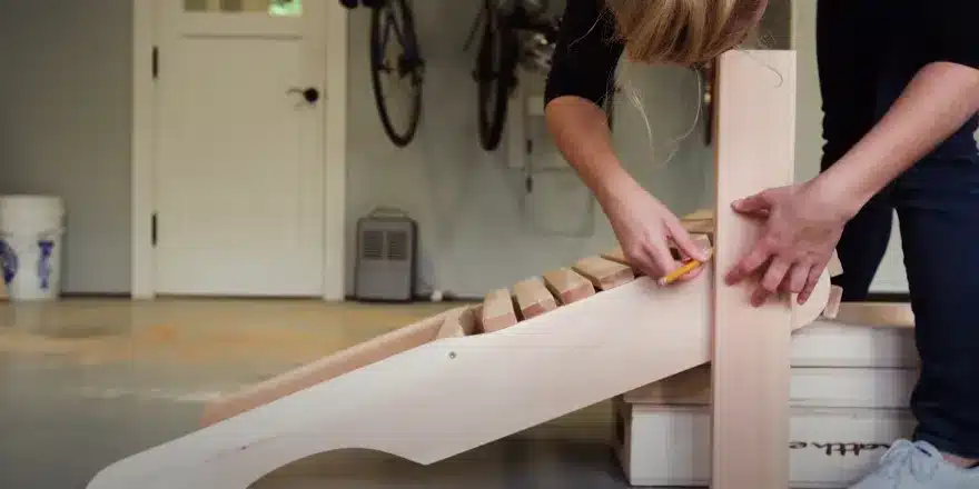 Adjust the position of the seat to attach the front legs
