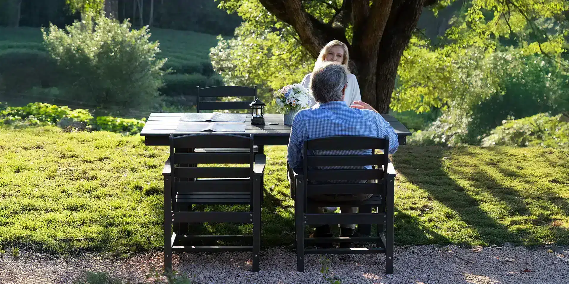Black Poly Outdoor Dining Table under the tree