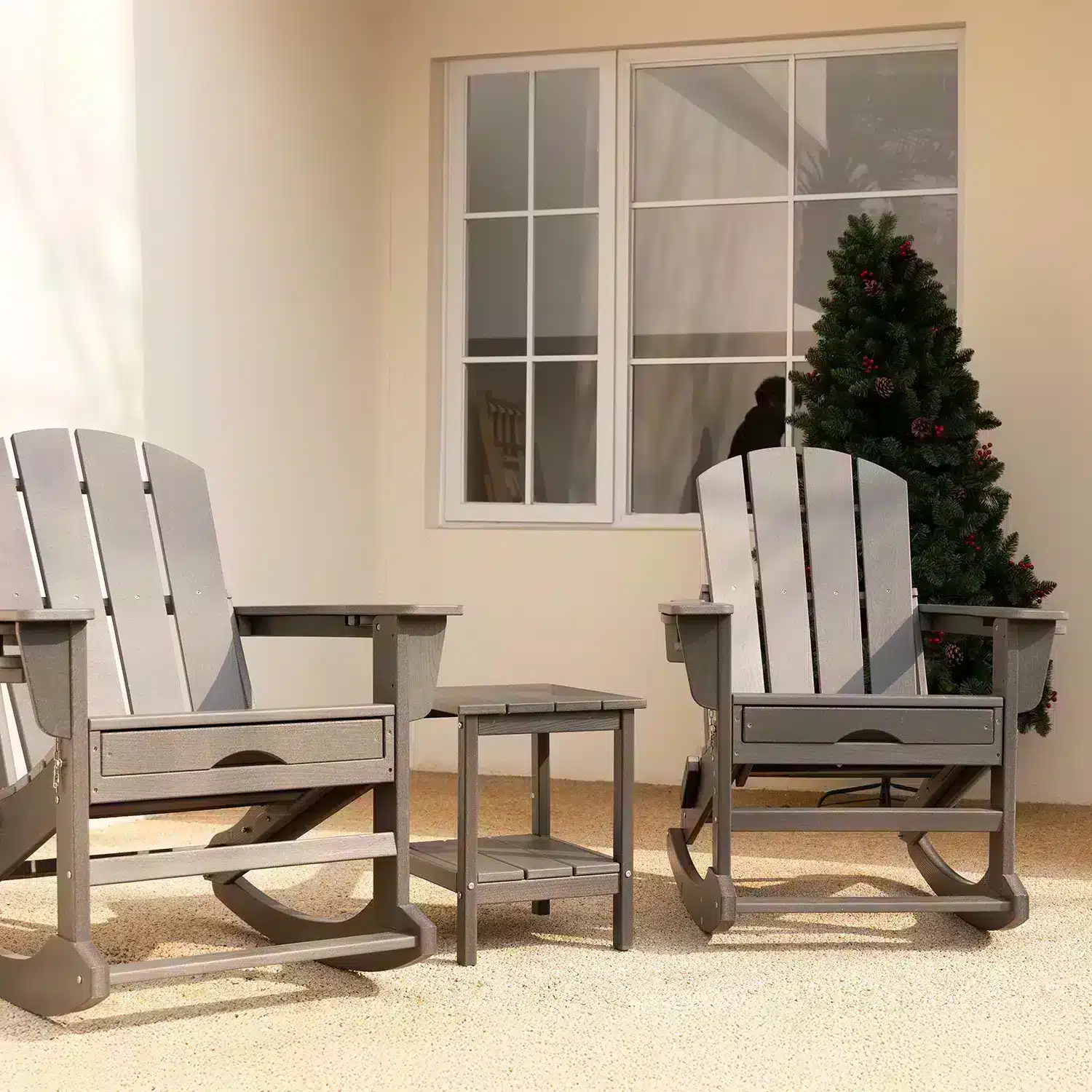 Folding Adirondack Rocking Chair with Ottoman & Cup Holder on the Porch