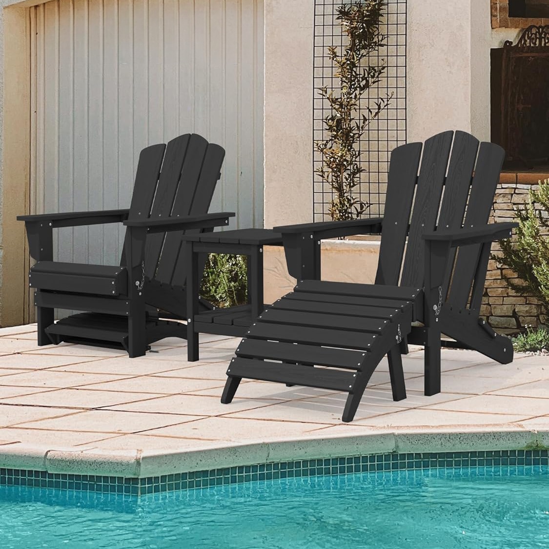Black Vintage Adirondack Chairs with footstool by the Pool