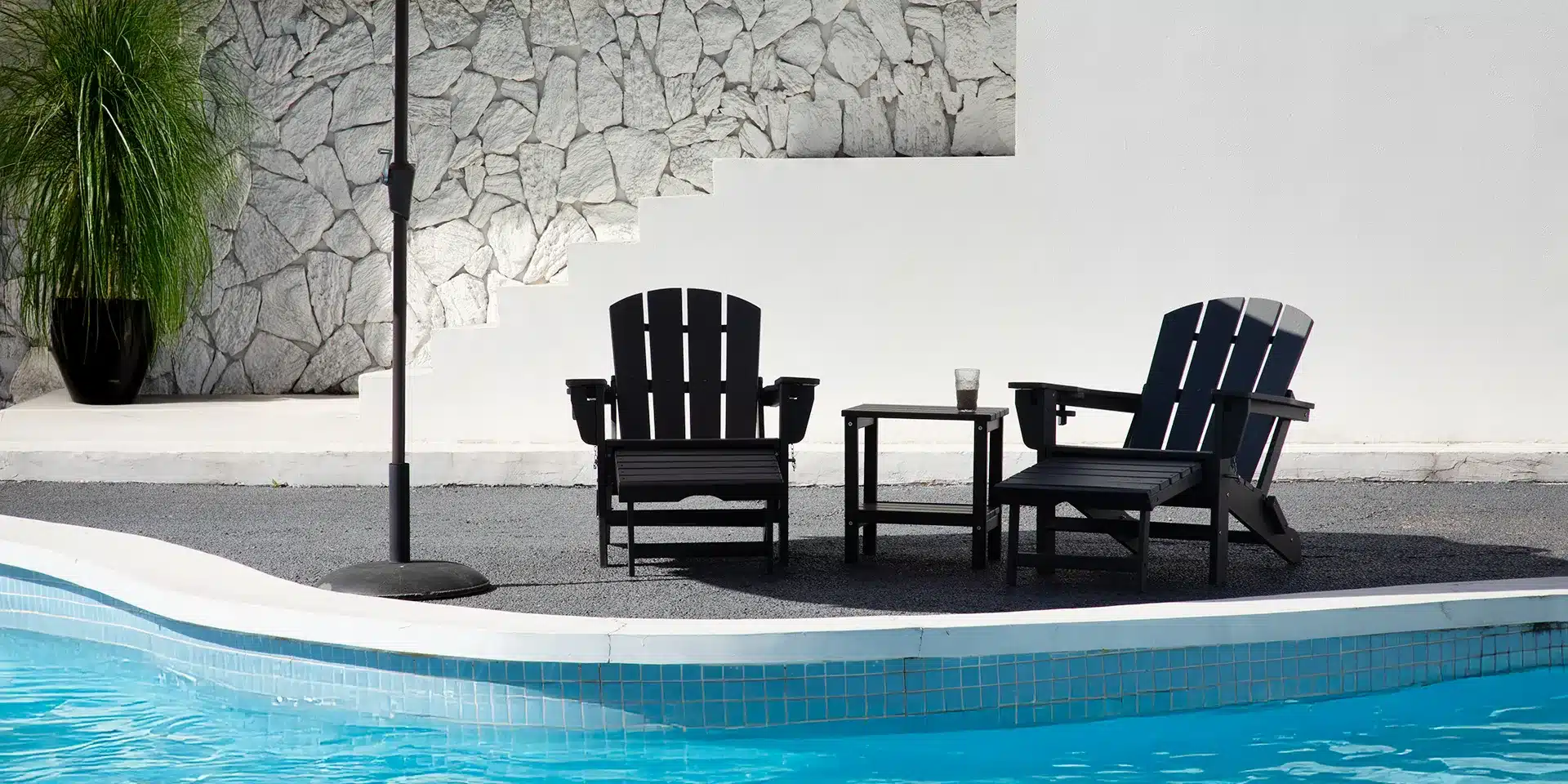 Reclining Black Adirondack Chairs with Ottoman Set of 2 by the Pool