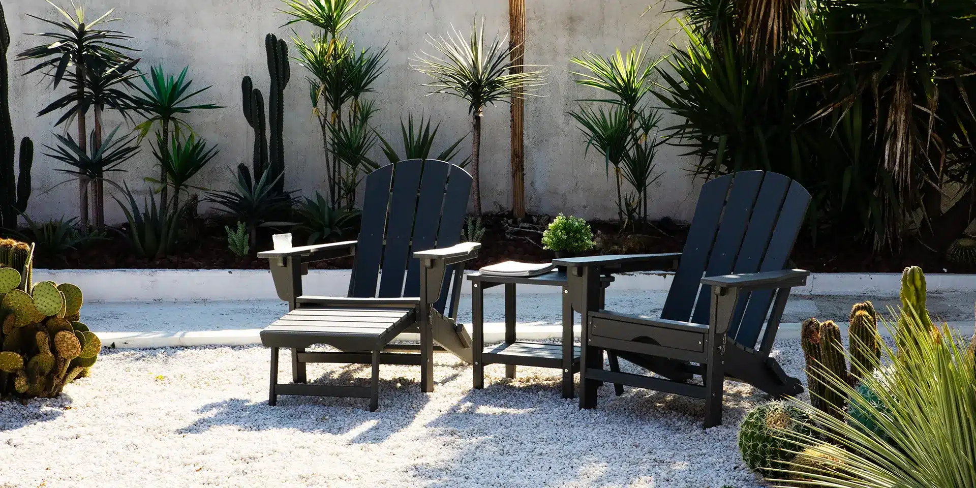 Black Reclining Adirondack Chair with Ottoman Set of 2 on the Garden