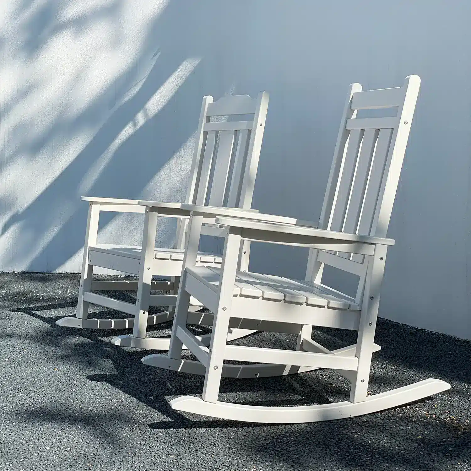 Two White Outdoor High Back Rocking Chair on the Front Porch
