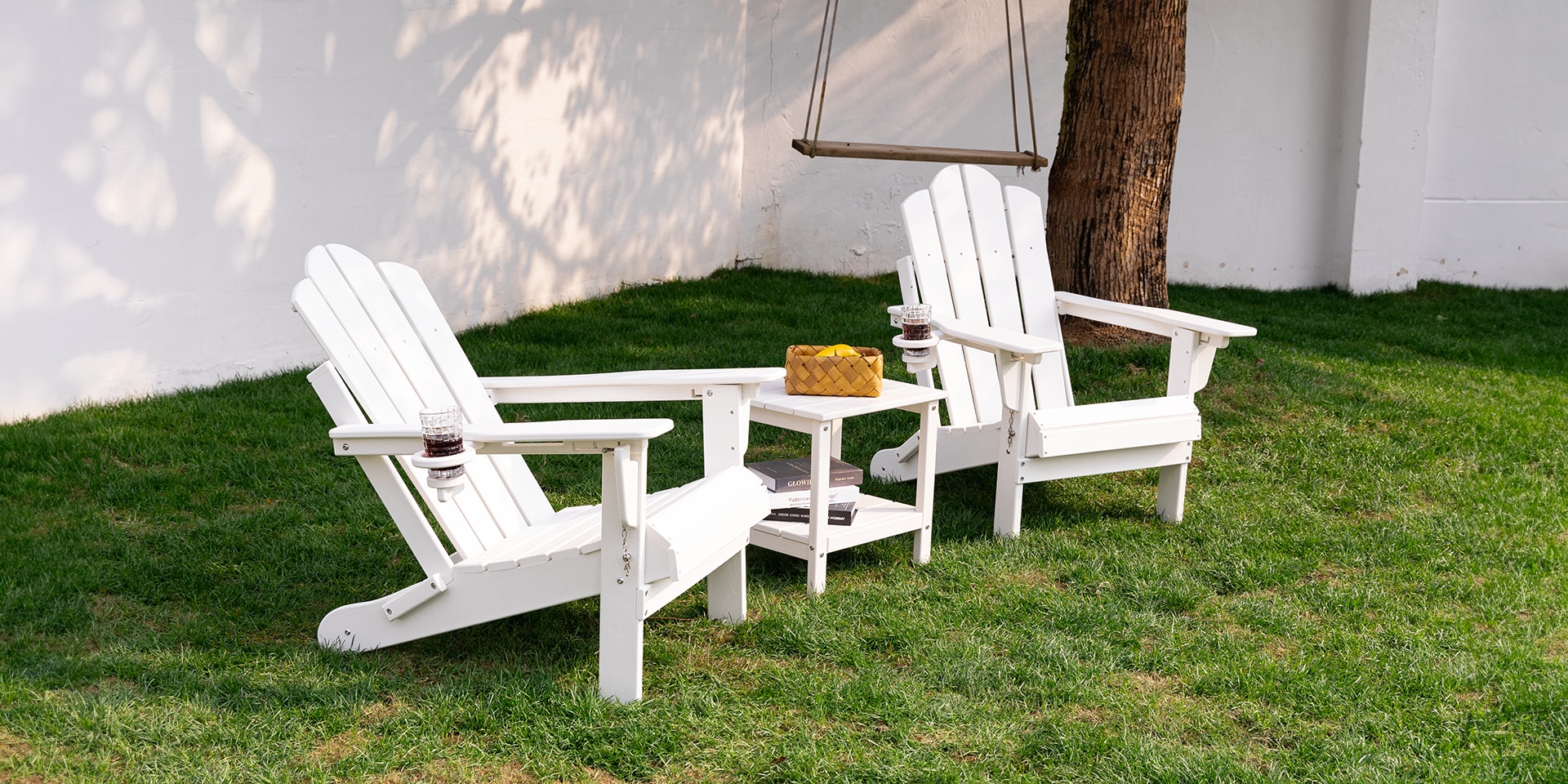 White Classic Adirondack Chairs Set with Side Table on the Patio