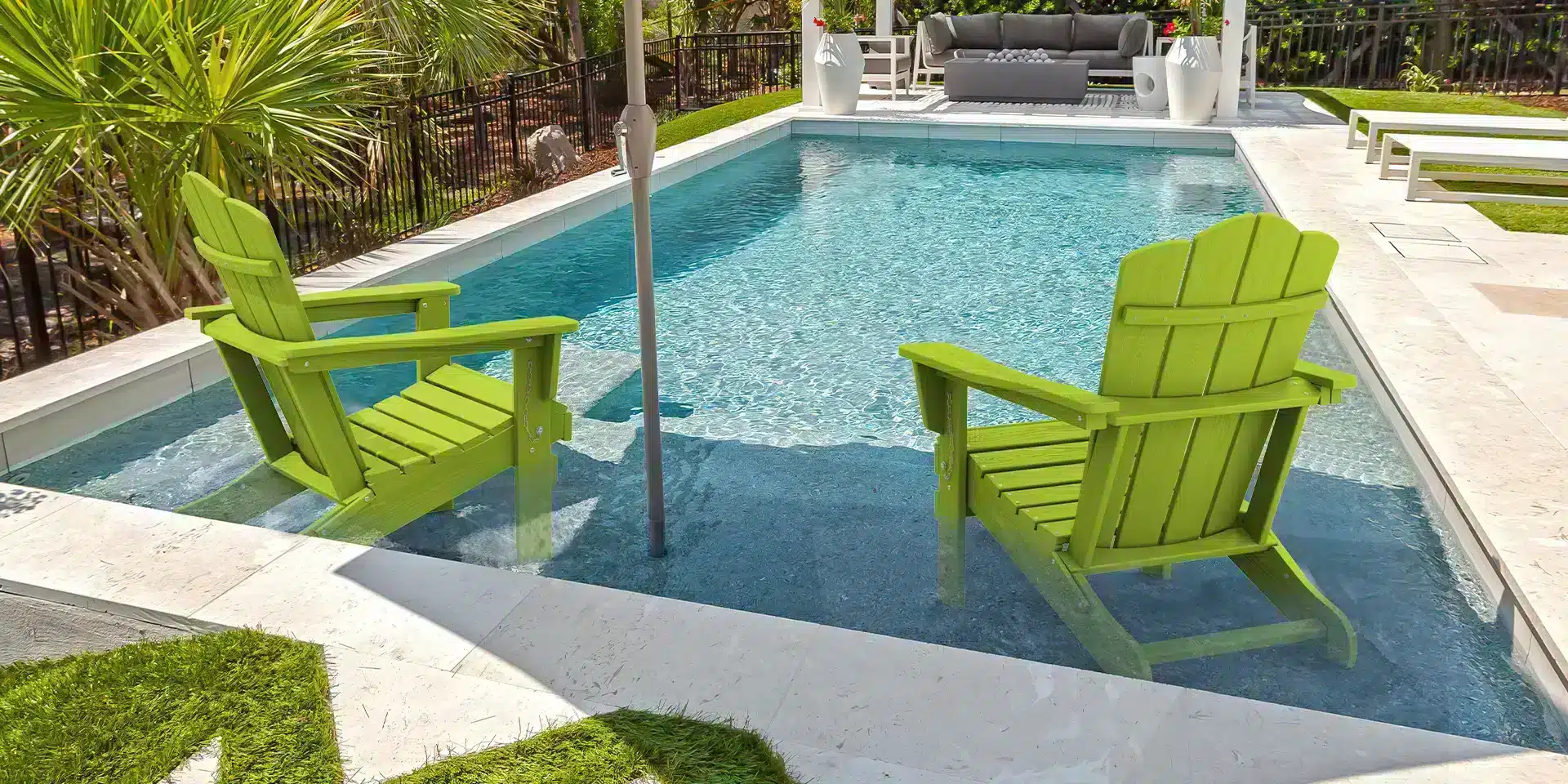 Green vintage folding Adirondack chairs in the pool (8)