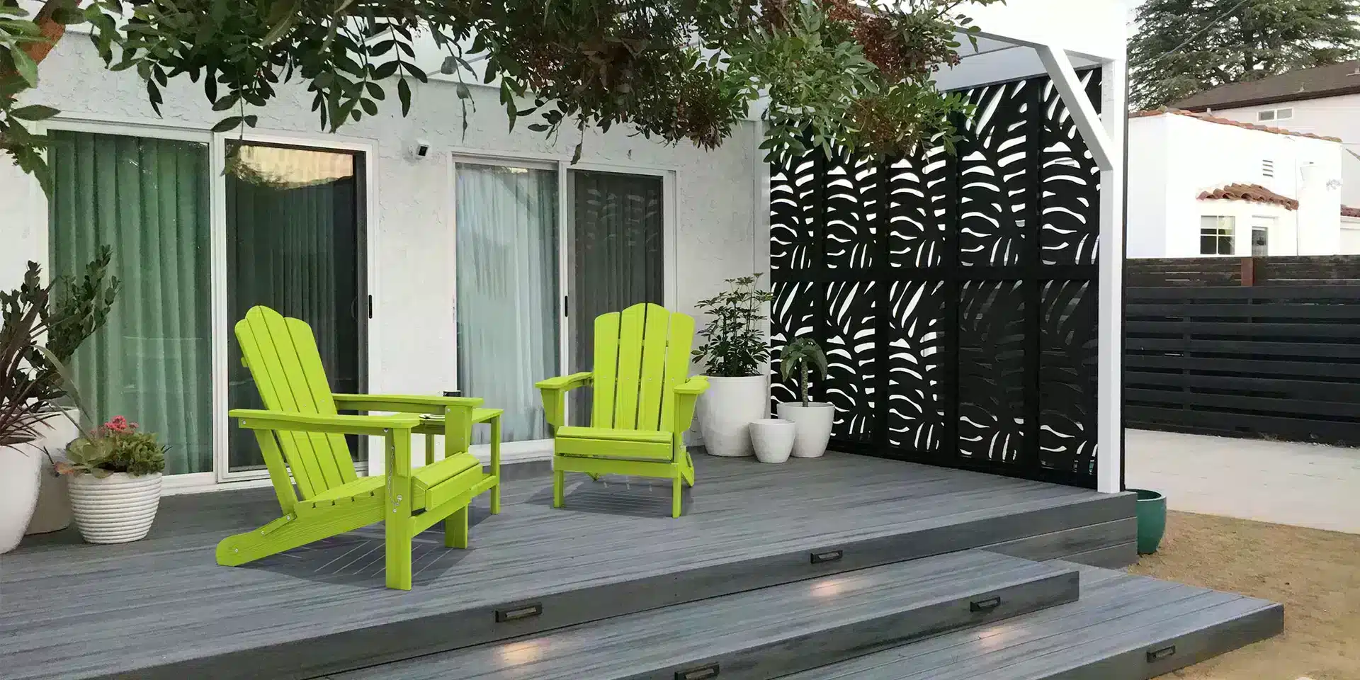 Green Adirondack Chairs on patio deck