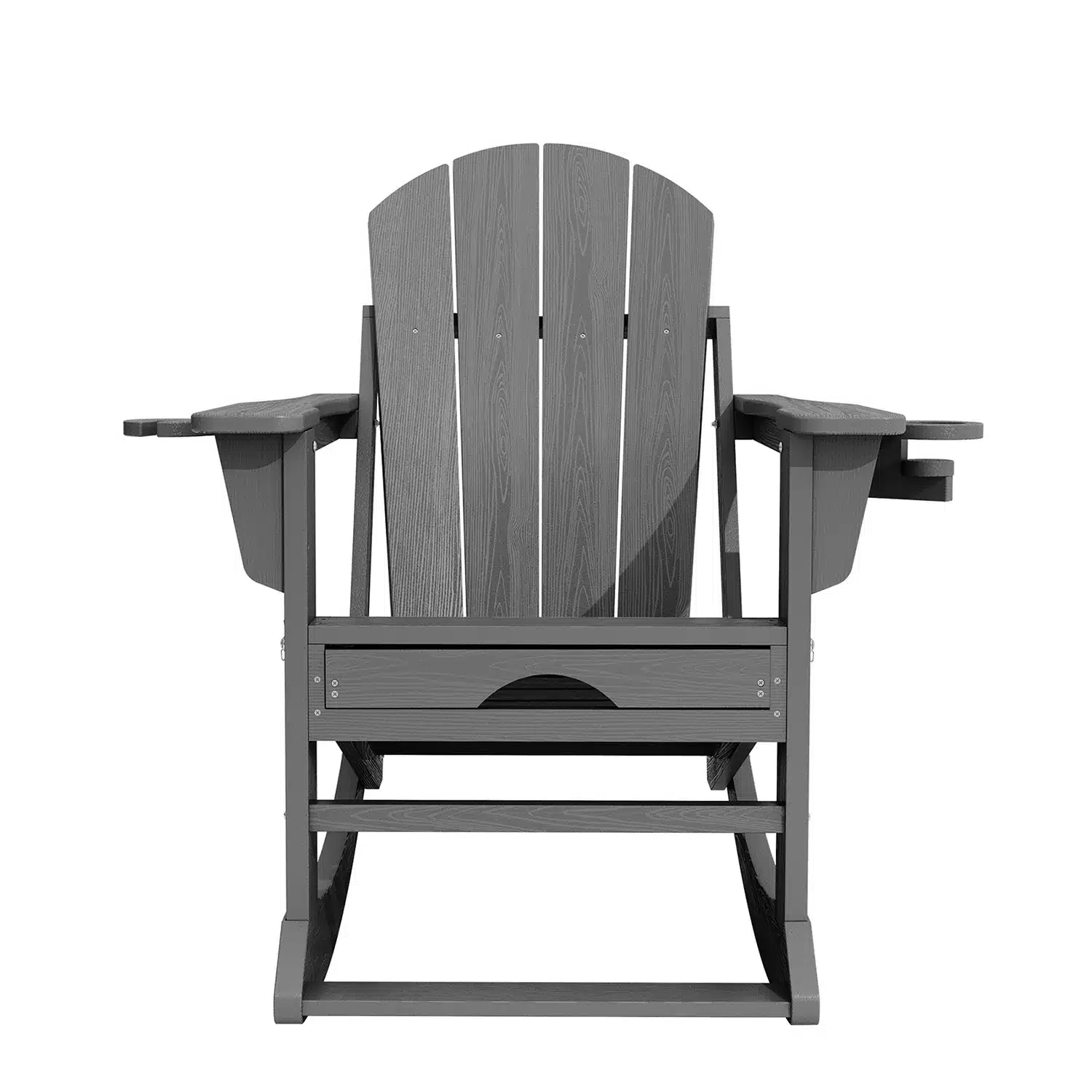 White wooden Adirondack chairs and table on a stone patio with a tree background