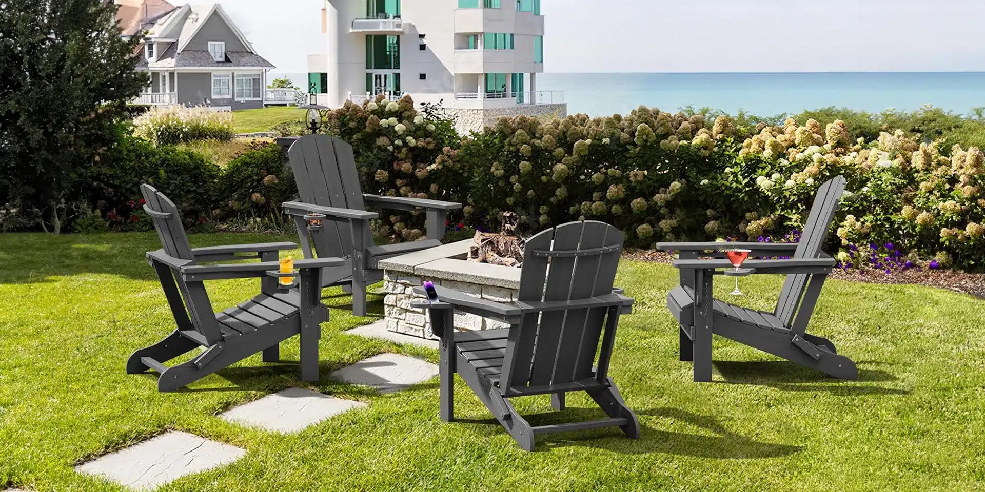 Four Classic Folding Adirondack Chairs on the Garden