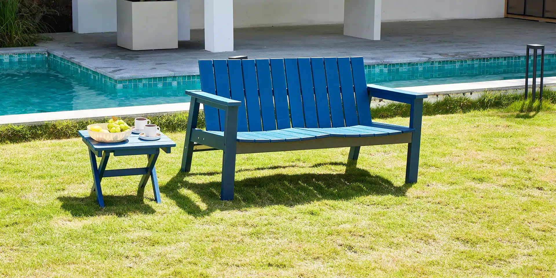 Navy Weatherproof Outdoor Bench with Side Table by the Poolside