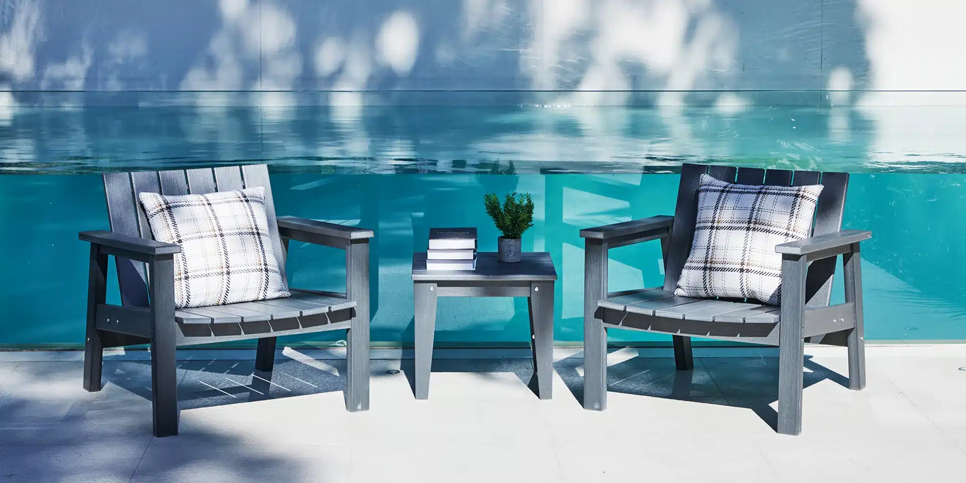 3 piece balcony set with plaid cushions by the pool