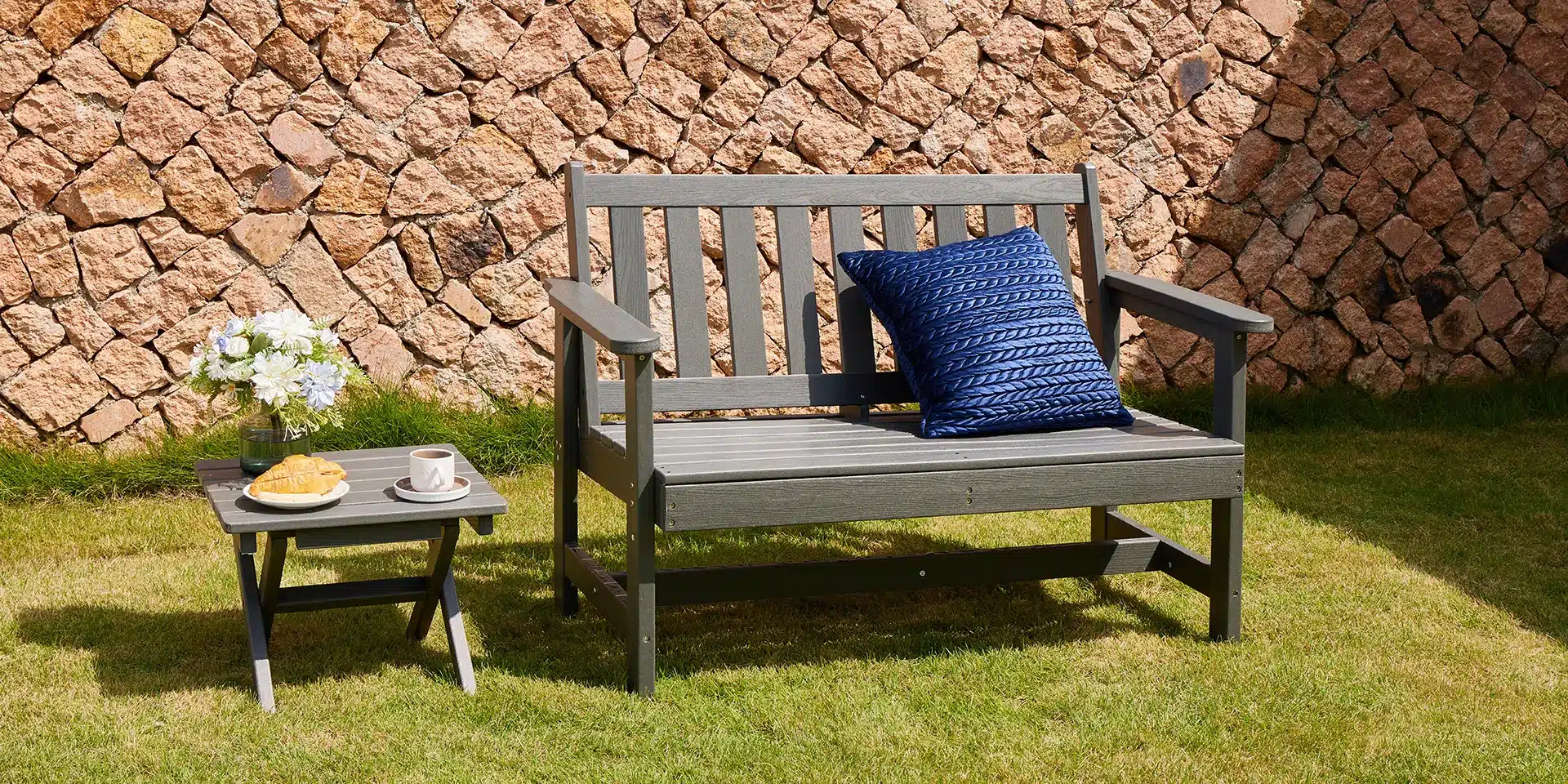recycled plastic outdoor bench with back and folding side table on the garden Recycled Plastic Outdoor Bench with Back and Folding Side Table on the Garden