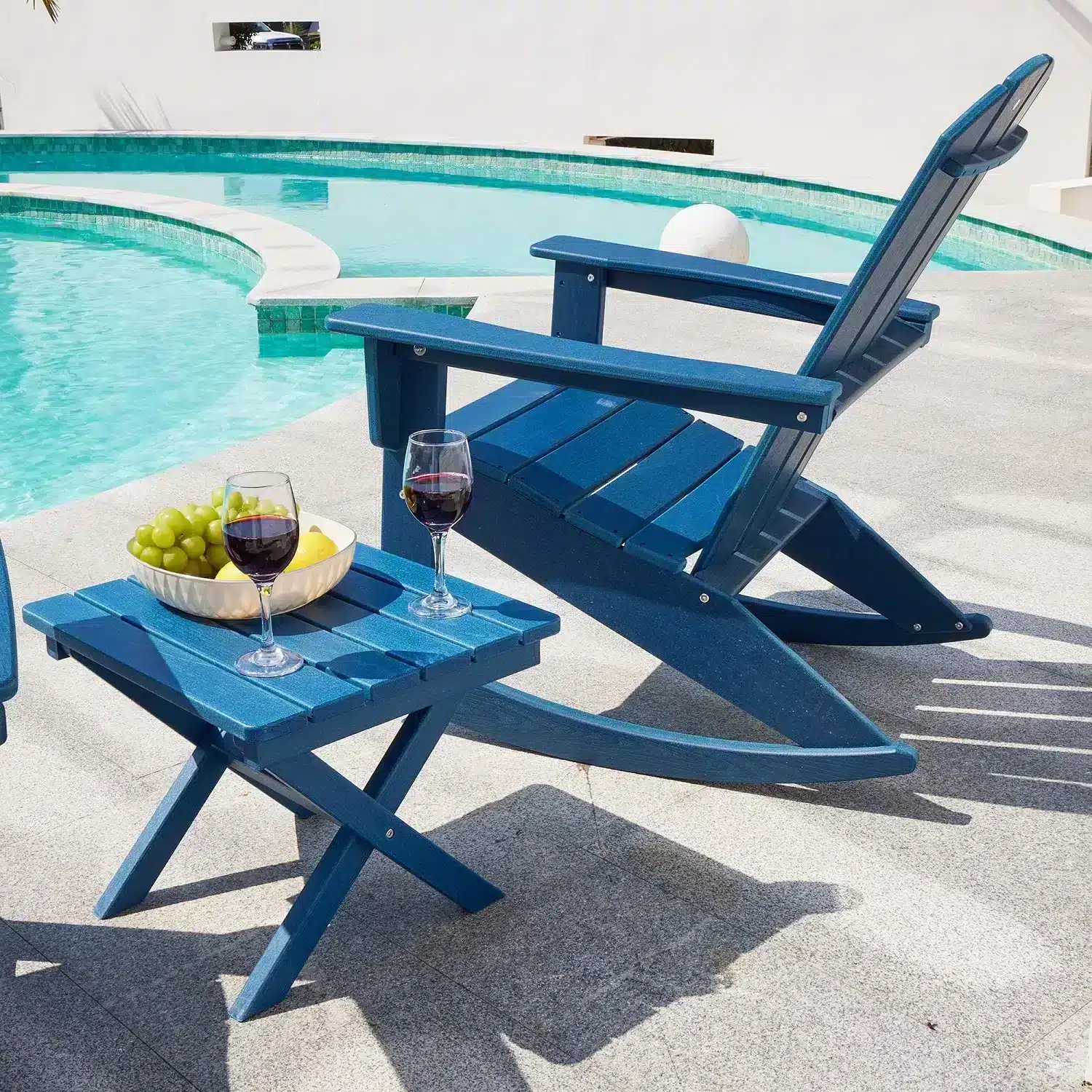 Outdoor Folding End Table with Fruit and Wine Glass by the Pool