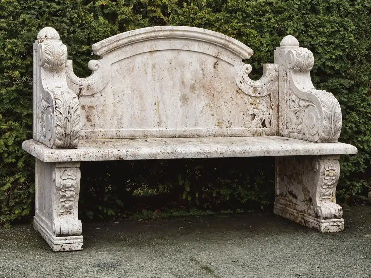 a stone bench similar to the design of ancient roman period A stone bench similar to the design of Ancient Roman period