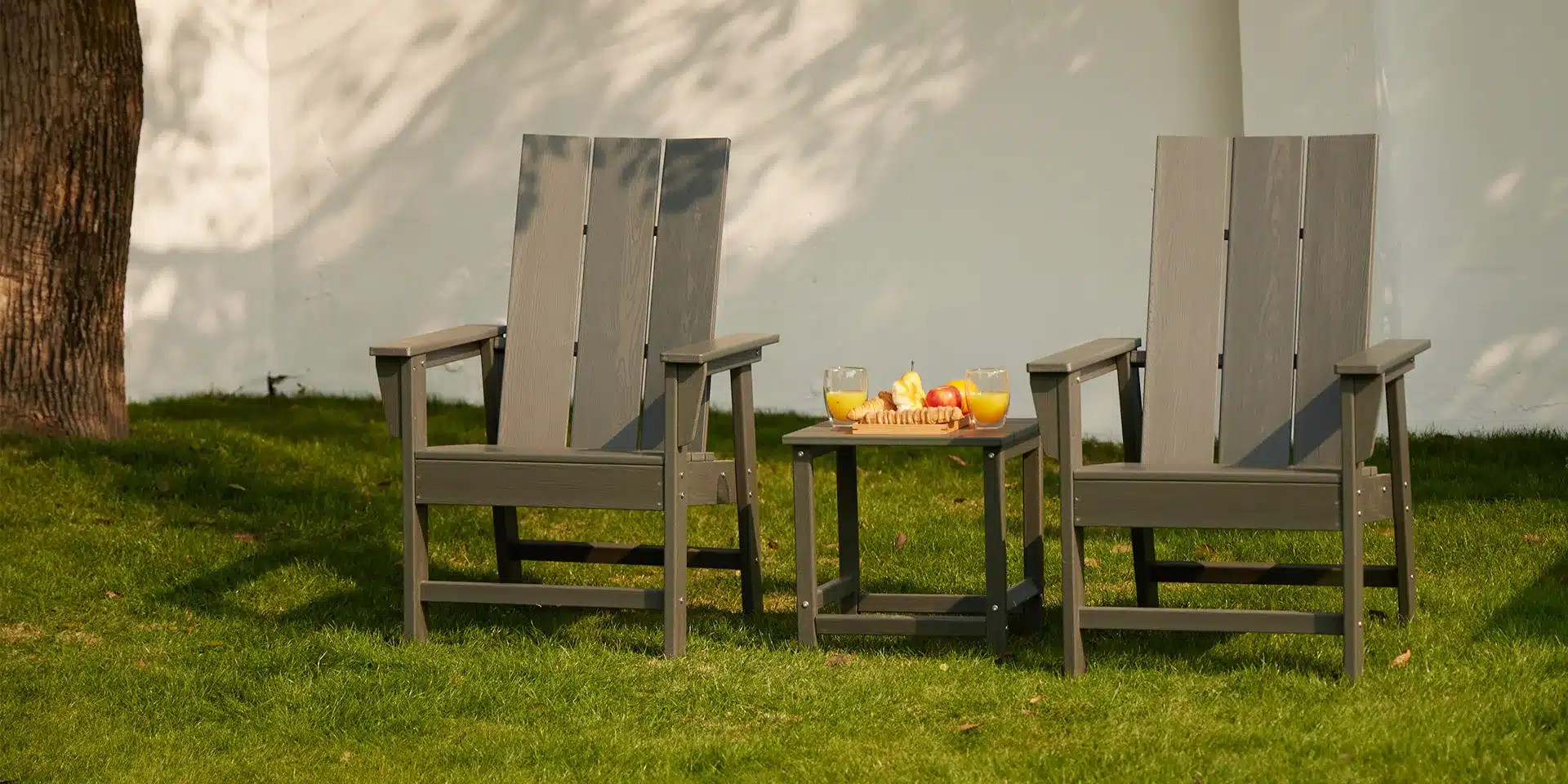 Dark Gray Outdoor Poly Dining Chair Set of 2 on the Grass