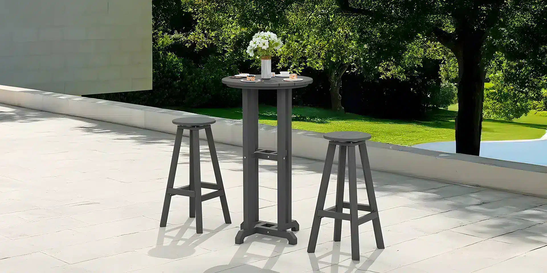 Dark Gray 3-piece Outdoor Bar Set with Stools on the Patio