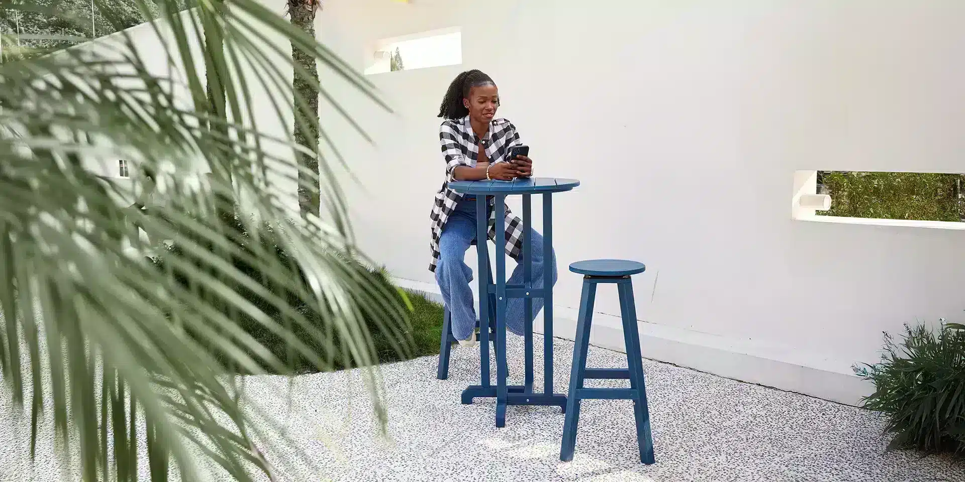 Swive Outdoor Barstool and Table Set on the Patio