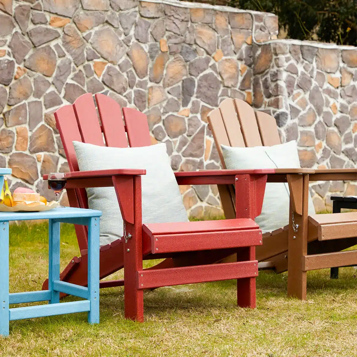 two adirondack chairs in the yard